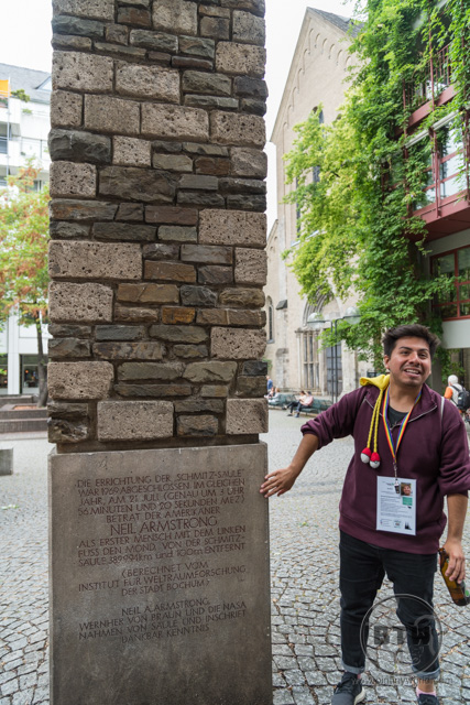 Our tour guide, Andre, talking about the Neil Armstrong pillar monument in Cologne, Germany