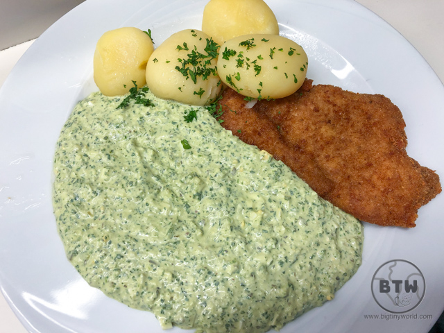 A schnitzel with green sauce in Frankfurt, Germany