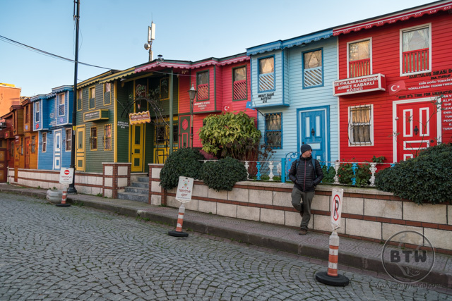 Aaron standing in front of colorful buildings in Istanbul, Turkey